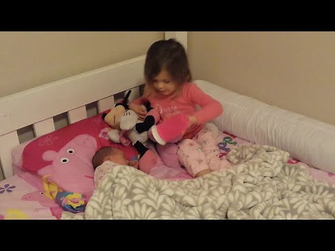 Newborn poops in toddler's bed