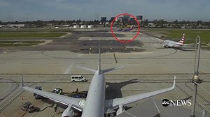 CLOSE CALL! This video shows the moment Harrison Ford flew over a packed commercial plane -- nearly hitting it -- before landing: 2wsb.tv/2kMkwaP | WSB-TV