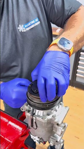 Key Thirteen for removing the hub from the air conditioner compressor.