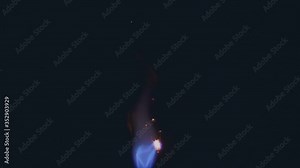 A jet of blue flame with bright yellow sparks in front of the flame, similar to a jet from a jet engine nozzle, on a black background. Closeup. Slow motion. High speed camera. V-log - High Dynamic Ran