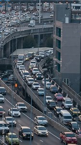 Vertical video time lapse of transportation traffic jam on express way in Bangkok, Thailand.