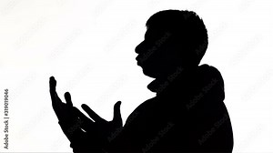 silhouette of a young man talking and gesticulate, creative person explaining idea on white isolated background, concept lifestyle