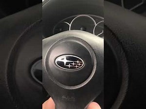 How to program a new remote control in the Subaru Impreza?