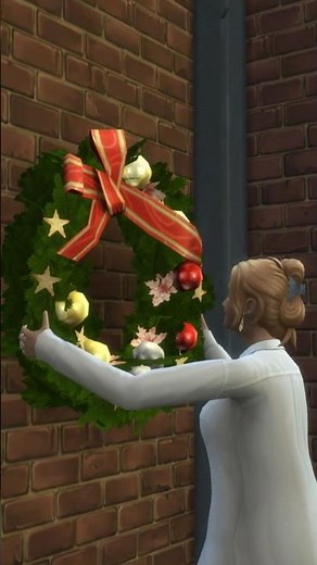 a Sim decorating for Winterfest