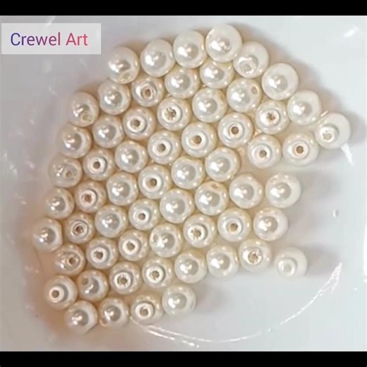 simple hand embroidery design with white pearl