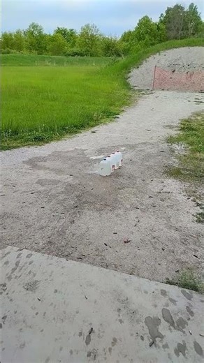 exploding water jugs with 40s&w #explosion #40s&w #boom #pewpewlife