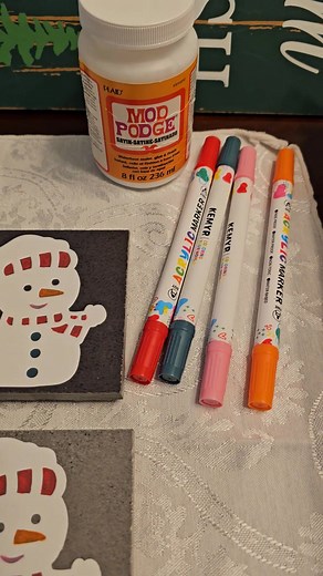 Fun and festive snowman Coasters made from upcycled porcelain tile and hand decorated! DIY or order from us! #barrasbasketsandgifts #snowman #coasters #upcycle #repurposed | Barra's Baskets and Gifts