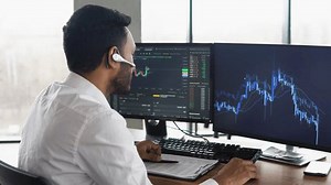 clip-1100871639-indian-business-man-trader-investor-analyst-looking