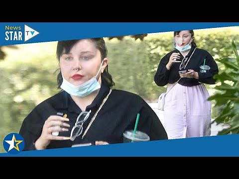 Amanda Bynes smokes a cigarette while on a stroll in LA amid fan support to end her conservatorship