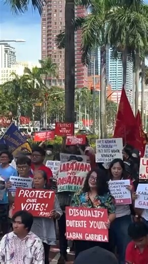 Members of women’s party-list Gabriela hold a protest along Padre Burgos cor. Roxas Boulevard in Manila to express their dismay over the Comelec’s assessment of the recently concluded elections and to call for a manual recount. #Halalan2025 | via Maria Tan, ABS-CBN News | ABS-CBN News
