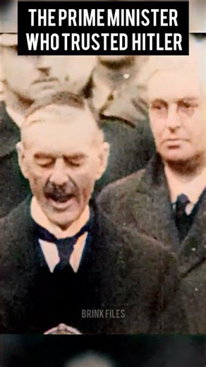 British Prime Minister Neville Chamberlain announcing his peace deal with Hitler
