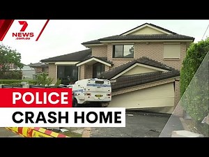 Police car ploughs through Merrylands home | 7NEWS