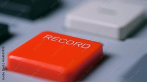 Man finger presses record red button starting device closeup. Male worker triggers recording process to device acknowledging commands in studio