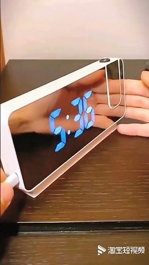 The projection clock clearly shows the time and temperature to set the alarm clock