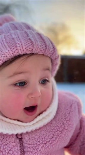 Her first time seeing snow... her reaction is everything! ❄️✨#FirstSnow #BabyFirsts #PureJoyToddlers