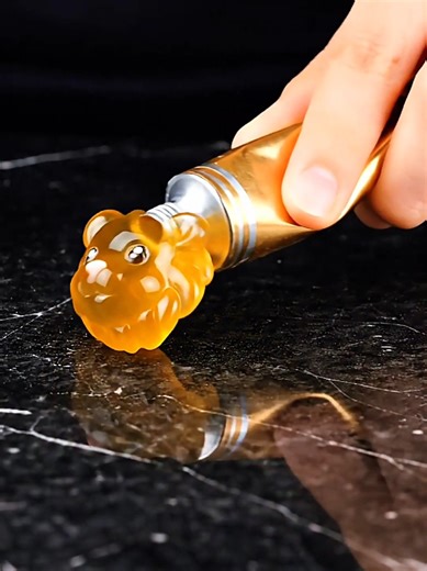 emoji only at the end: Squeeze the tube… why is there a lion? 🤔 #asmr #ai #asmrsounds #satisfying #ForYou