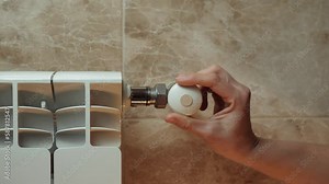 Radiator knob. Adjusting temperature on heating radiator. Turn on the heating. Turn off the heating.