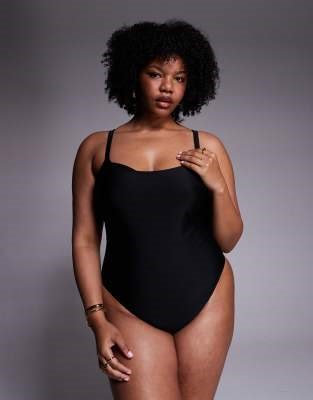 ASOS DESIGN Curve Revenge sculpting hidden underwire swimsuit in black | ASOS