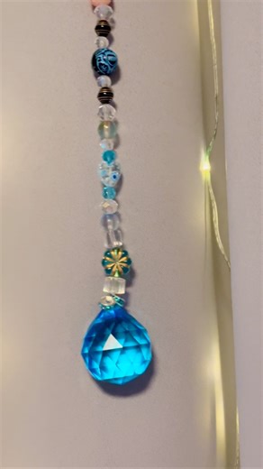 Tina Marie. on Instagram: "💙🩵 Turquoise Magic for Your Space 🩵💙 Turquoise is a stone of protection, calm, and truth — believed to cleanse stagnant energy while inviting peace, balance, and gentle confidence into your surroundings ✨ This handmade K9 crystal suncatcher catches the light beautifully, scattering soft reflections while surrounding your space with intentional, soothing vibes. A small ritual of light for windows, sacred corners, or creative spaces 🌙 🔮 One of a kind 💎 1.25” facet