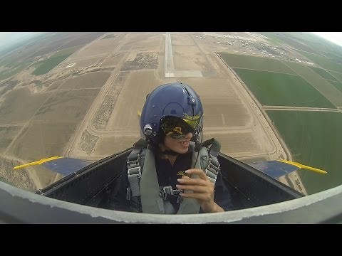 Female first gets ride with Blue Angels