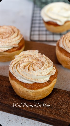 Izabella Jakubec on Instagram: "Mini Pumpkin Pies are officially the dessert of autumn — flaky, spiced, and dangerously easy to love 🧡🍂 They’ve got it all: buttery puff pastry, silky pumpkin filling, and that swirl of cream cheese frosting on top (plus a dusting of cinnamon, because we’re extra like that). Perfect for parties, coffee breaks… or just you, a fork, and zero regrets 😏 And speaking of flaky goodness… my cookbook “Everything Is Better With Puff Pastry” is coming out this December! 