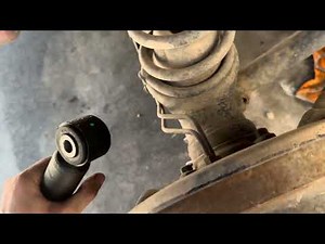 Anthony's 2002 Chevy Tracker - New shock vs old shock comparison; Right rear shock installation