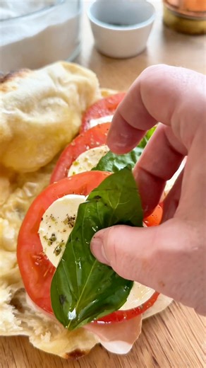 1.1M views · 8.7K reactions | This is my most viewed pizza sandwich and still one of my favorites. Prosciutto, marinated tomatoes, fresh mozzarella, and basil with good olive oil on rosemary sourdough crust. | Seanspizza | Facebook