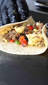 Homemade breakfast burritos on a griddle for busy mornings