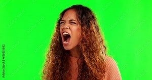 Angry, screaming and woman in green screen studio with stress, problem or conflict, crisis or issue. Frustrated, wtf and lady shouting in anger, anxiety or fail, trouble or overwhelmed grief reaction