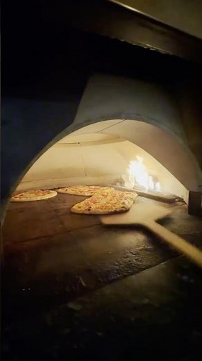 Taste Paradise with Our Brick Oven Pizza! 🍕🌺 #Shorts