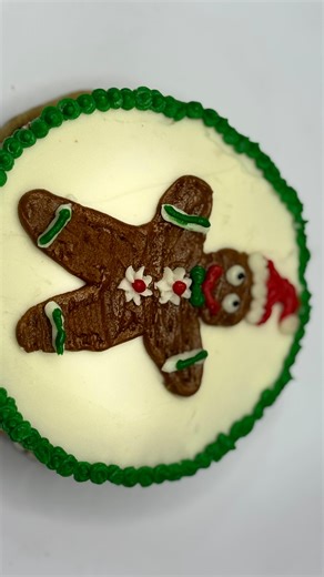 Run, run as fast as you can, to get your hands on this gingerbread man! He’s cute and deliciously made out of our almond buttercream and placed perfectly on top of our classic chocolate chip cookie cake. Send us a message for a custom order! #weazerscookies #ankeny #desmoines #cookies #buttercream #gingerbread #christmas #yum #runrunrun | Weazer’s Cookies and Treats
