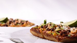 Another favorite is back for June! The Love It Elote is our Mexican Street Corn pizza. It has Mexican Street Corn Sauce, Fire Roasted Corn, Chorizo, Cotija Cheese, Cilantro, and is served with a Lime Wedge. | Azzip Pizza