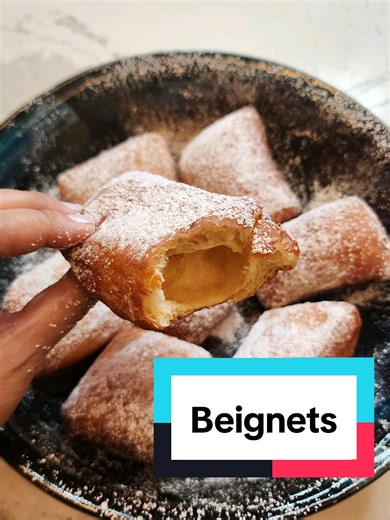 Beignets Recipe | Classic New Orleans Fried Dough Learn how to make traditional beignets at home. This recipe shows the full process for New Orleans–style beignets, from mixing the dough to frying until light and fluffy, then finishing with powdered sugar. A classic beignet recipe you can make from scratch. Ingredients: 3/4 c warm water 1/4 c sugar 1 tsp yeast 1 egg 1/2 tsp salt 1/2 c evaporated milk 420 g bread flour 24 g shortening neutral oil for frying powdered sugar for coating Instructions