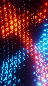 Wall of mirrors with lights on them in room. Vertical looped animation