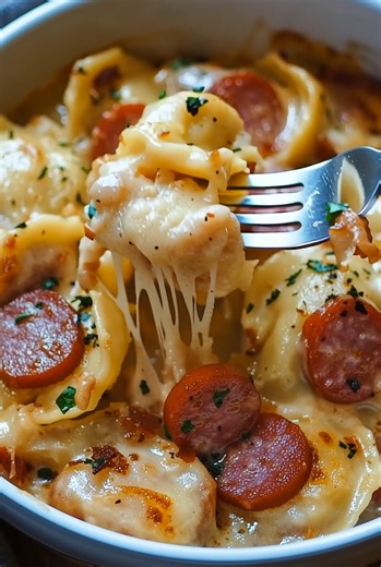 Crockpot Pierogi Casserole with Kielbasa Ingredients: 1 (16–20 oz) box frozen pierogies (any flavor) 1 lb kielbasa, sliced 1 small onion, diced 1 cup shredded cheddar cheese 1 cup sour cream 1 can (10.5 oz) cream of chicken soup ½ cup chicken broth Salt & pepper to taste Instructions: Add pierogies: Place frozen pierogies in the bottom of the crockpot. Add kielbasa & onions: Layer sliced kielbasa and diced onion on top. Mix sauce: In a bowl, whisk together sour cream, cream of chicken soup, chic