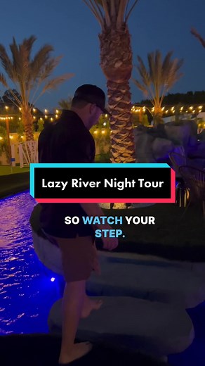 Check out the NEW Lazy River lit up at night! #backyardoasis #poolgoals #backyardinspiration #landscapedesign #shorttermrentals #lazyriverpool #luxuryvacation Designed by @Foxterra Design