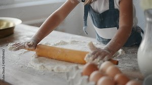 Two girls are cooking in the kitchen