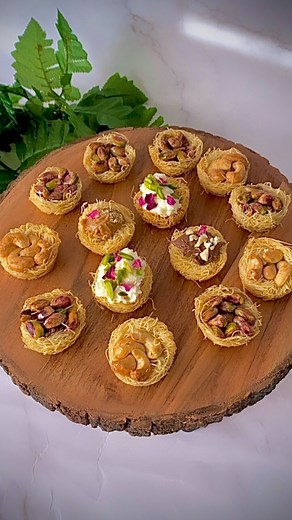 𝓜𝓪𝓻𝓲𝓪𝓶 on Instagram‎: "Eid is just 2 days away, and I’ve got the perfect easy dessert for you! Middle Eastern Bird Nest Baklava, known as “Oush El-Bulbul” (عش البلبل) in Arabic, is a delicate and beautiful treat made with crispy kataifi dough shaped into little nests and filled with sweet, rich toppings. Whether you choose nuts, cream, or chocolate, each bite is golden, crunchy, and irresistible—perfect for Eid or any special occasion! Ingredients 1/2 lb of Kataifi Osmanliya shredded dough