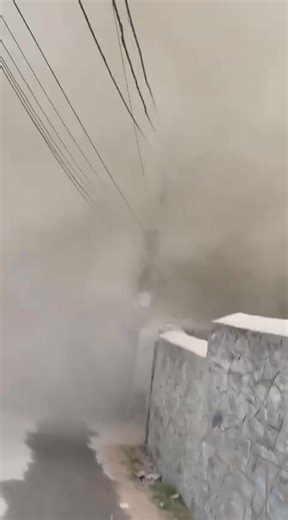 Panic gripped Baramulla town on Friday evening after a portion of a stone quarry suddenly caved in at Khanpora, sending massive clouds of dust and smoke into the air and engulfing several surrounding areas. The incident affected Khanpora, Drangbal, Sheeri and parts of the Old Town, causing widespread fear among residents. | ANN News Kashmir