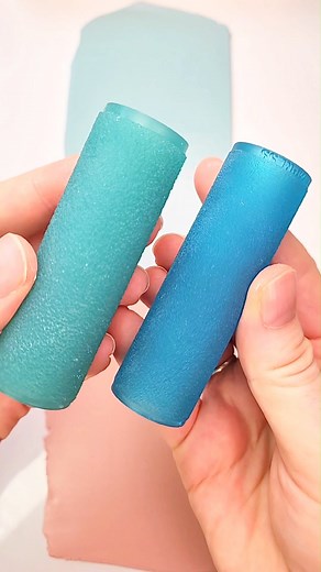 I wanted to add a nice sandpaper texture to my coral dangle earrings so I grabbed my 80 grit sandpaper and rolled it into my pristine clay. To my dismay, when I lifted the sandpaper, there was a bunch of little pieces of grit in my clay. 😡 I spent the next ten minutes scraping and picking all of the little sandpaper bits out of my clay while cussing and deciding to make sandpaper rollers. Here they are! Now you too can have a nice sandpaper texture without worrying about random pieces of grit g