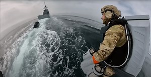 Watch a jetpack-flying Royal Marine board a ship like freakin' Boba Fett
