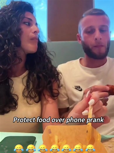 Girlfriend Protects Her Food Over the Phone Prank