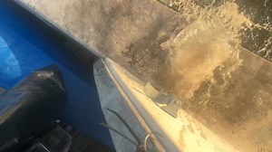 Snuba Of Key West Josh said I was going to sink my boat. I bored out the bilge pump and rerouted it. | Ty Morlang