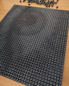 These Artists Make Portraits Entirely from Dice