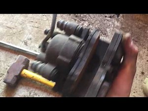 How to remove the brake caliper and line off your Dodge neon