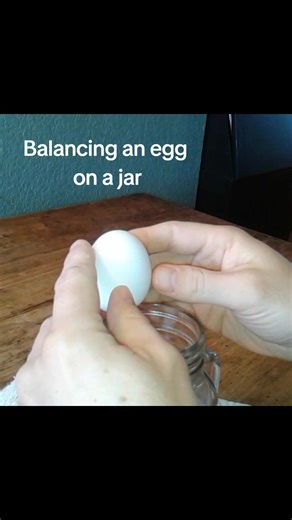 Balancing an egg on a flat surface takes a steady hand and patience. Doing it on the end of jar takes even more. #jar #steadyhandschallenge #waitforit😱 #ontheedge #eggbalancer