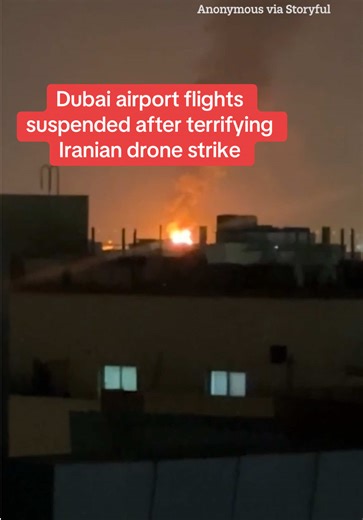 Flights to and from Dubai airport have been suspended after a terrifying Iranian drone strike sparked a fire – with several journeys axed entirely and a 'please don't travel' warning. Read the full story above. #dronestrike #dubaiairport #travelwarning