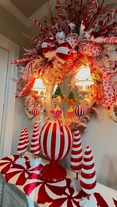 1K reactions · 67 comments | Creating some Peppermint MAGIC on a Mirror in a side hall. You know no space is off limits. ❣️懶❣️ Mirrors are my FAV to decorate! I hope you enjoy. Please excuse my hands in video~ it’s hard to keep them out of the mirror view. Ornaments & ribbon from @craftexinc ❣️ Miss Peppermint from @markrobertsmagic ❣️ #holidaydecor #christmas #christmasdecor #christmastree #peppermint #homedecor | Ba Bam Wreaths | Facebook