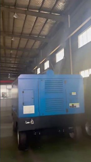 Real factory footage of an industrial air compressor in operation.