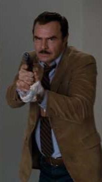 Burt Reynolds uses a Colt Government Model. Henry Silva. Sharky's Machine (1981)Burt Reynolds 📽
